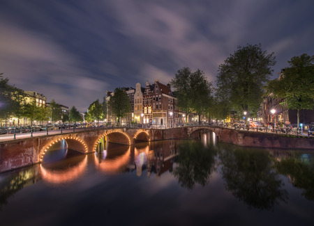 Night lights over Amsterdam channels, Hollandの写真素材