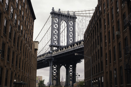 Manhattan Bridge from a Brooklyn`s streetの写真素材