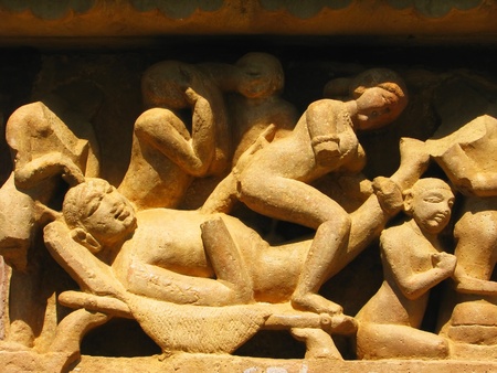 Stone carved erotic sculptures in Hindu temple in Khajuraho, Madhya Pradesh, Indiaの写真素材