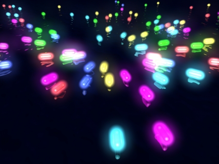 Multi-coloured capsules fly over waterの写真素材