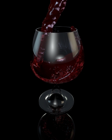 The wine is poured into a glass on a black backgroundの写真素材