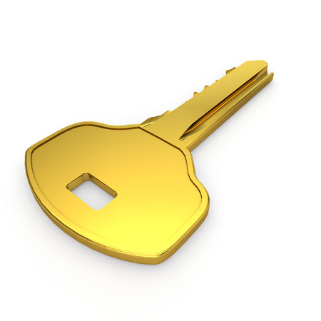 Golden small door key. Isolated backgroundの写真素材