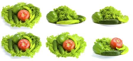 Collection. Salad, hot pepper, the Bulgarian pepper and cucumber on a plate on the white isolated backgroundの写真素材
