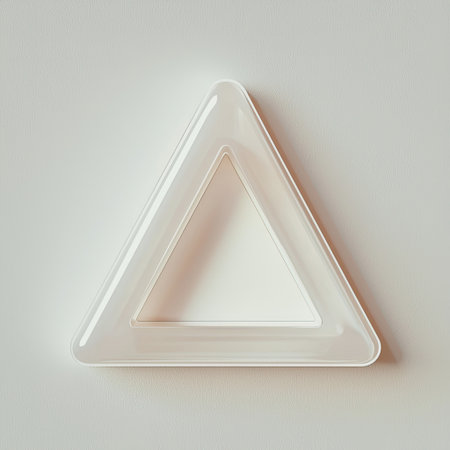 A minimalist white triangle plate is set against a soft textured background, showcasing its elegant design and versatility for modern dining and decor.の素材
