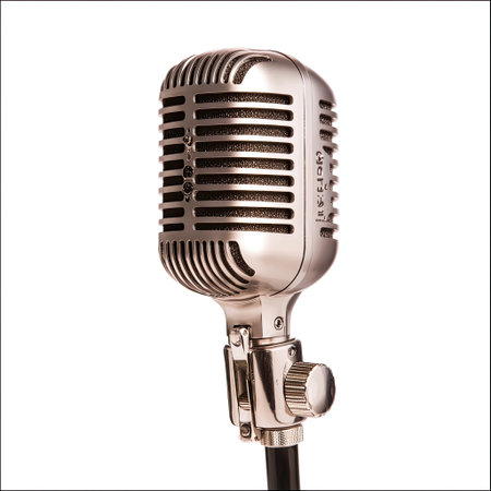 This image showcases a vintage-style microphone featuring an elegant silver finish, perfect for music studios, performances, and retro-themed events.の素材