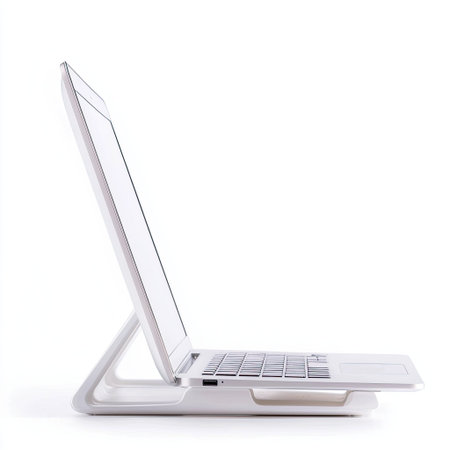 A sleek and modern laptop stands upright on a white background, showcasing its minimalistic design. Ideal for technology enthusiasts and office use, this image emphasizes usability and style in a contemporary workspace.の素材