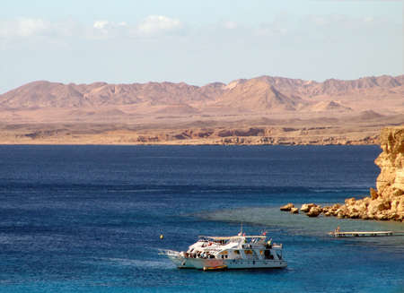 the wite ship in the red seaの写真素材