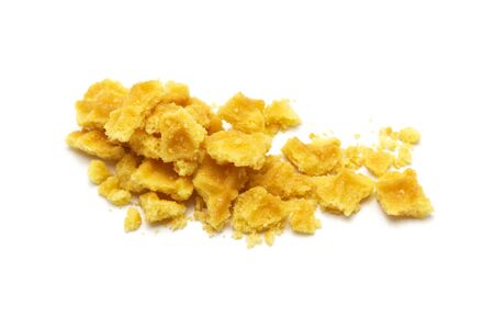Crumbs of waffle crisp butter flavor biscuits isolated on white background.