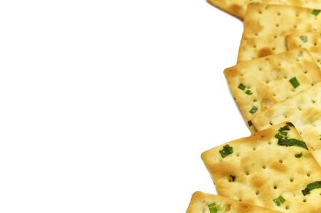 Biscuits cracker square design.Great flavor combination of green onion and wheat. Isolated on white background. Copy space.の写真素材