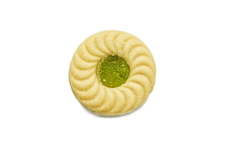 Biscuit sandwich butter cookies with cream and Kiwi&Apple flavoured jam. A stack of crunchy delicious sweet meal and useful cracker. isolated on white background. Soft focus.の写真素材