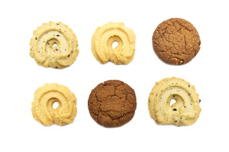 Collection of cookies and biscuit with different flavor, chocolate chip butter, vanilla and black sesame. Isolated on white background.の写真素材