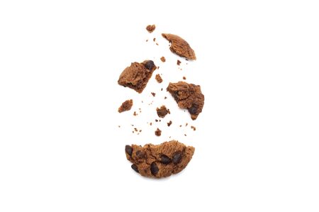 Chocolate chip cookies with some broken and crumbs isolated on white background in Top view.