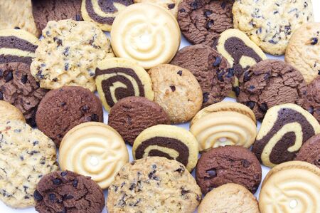 A group of assorted cookies. Chocolate chip, oatmeal, raisin, Danish cookies and biscuits in the...
