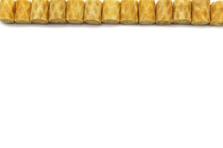 Biscuit roll filling with cream flavour isolated on white background and copy space.