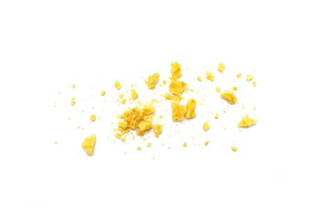 Crumbs of waffle crisp butter flavor biscuits isolated on white background.の写真素材