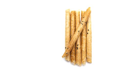 Tong Muan (crispy egg roll mix with sesame), Thai dessert Roll wafer, A traditional dessert in Thailand isolated on white background and copy space.の写真素材