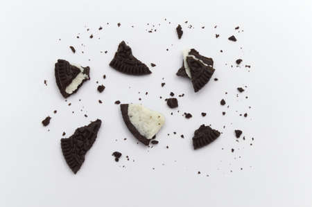 LAMPHUN, THAILAND - JUNE 14, 2019: Oreo Biscuits with crumbs on white background. It is a sandwich...