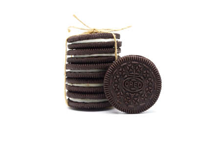 Oreo Biscuits on white background. Sandwich chocolate cookies with a sweet cream is the best selling dessert in Thailand.のeditorial素材
