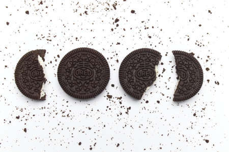 LAMPHUN, THAILAND - JUNE 25, 2019: Oreo Biscuits with crumbs on white background. It is a sandwich...