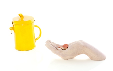 collecting coins for charity donation isolated  over whiteの写真素材