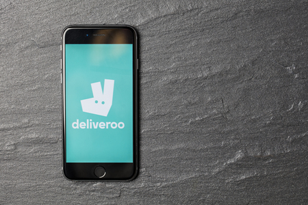 LONDON, UK - NOVEMBER 9th 2017: An apple iPhone showing the Deliveroo application logo. Deliveroo is an online takeaway delivery serviceのeditorial素材