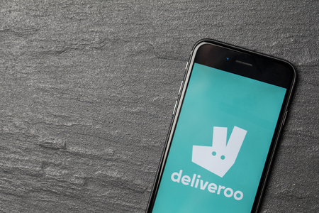 LONDON, UK - NOVEMBER 9th 2017: An apple iPhone showing the Deliveroo application logo. Deliveroo is an online takeaway delivery serviceのeditorial素材