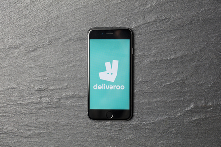 LONDON, UK - NOVEMBER 9th 2017: An apple iPhone showing the Deliveroo application logo. Deliveroo is an online takeaway delivery serviceのeditorial素材