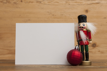 Festive christmas nutcracker soldier toy with blank card label