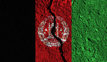 Afghanistan flag with crack through the middle. Country divided conceptの写真素材