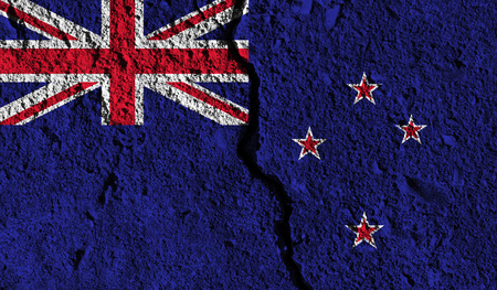 New Zealand flag with crack through the middle. Country divided conceptの写真素材