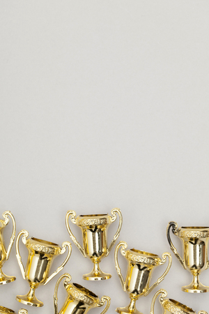 Gold winners achievement trophy backgroundの写真素材