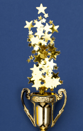 Gold winners achievement trophy backgroundの写真素材