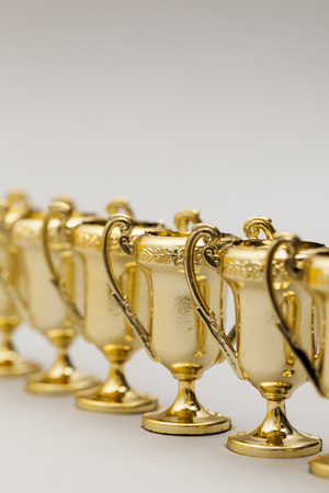 Gold winners achievement trophy backgroundの写真素材