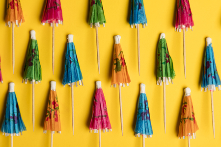 Cocktail umbrella summertime background