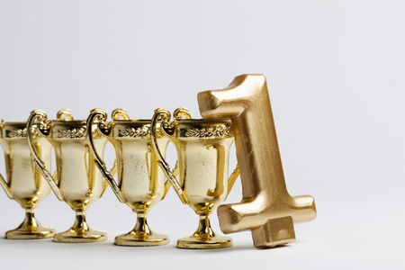 Gold winners achievement trophy backgroundの写真素材