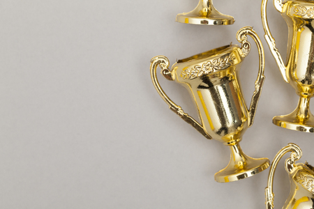 Gold winners achievement trophy backgroundの写真素材