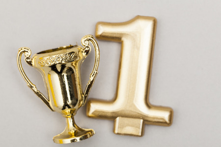 Gold winners achievement trophy backgroundの写真素材