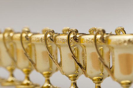 Gold winners achievement trophy backgroundの写真素材