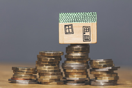 House model with coins. Home finance conceptの写真素材