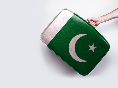 Pakistan flag on a vintage leather suitcase.の写真素材