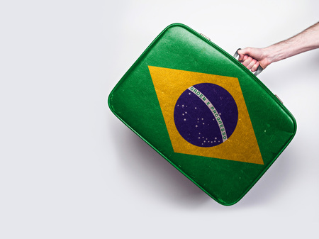 Brazil flag on a vintage leather suitcase.の写真素材