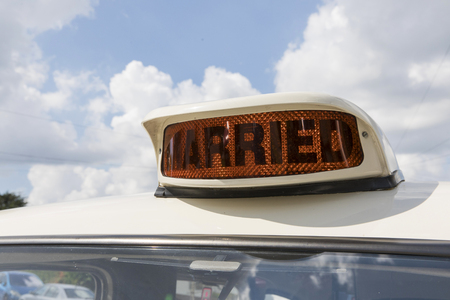 Traditional wedding car with married signの写真素材
