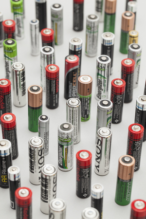 LONDON, UK - January 10th 2018 A collection of branded batteries background. Energy supply and recycling conceptのeditorial素材