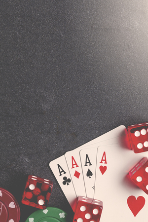 Ace playing cards with red dice. Casino betting and gambling concept