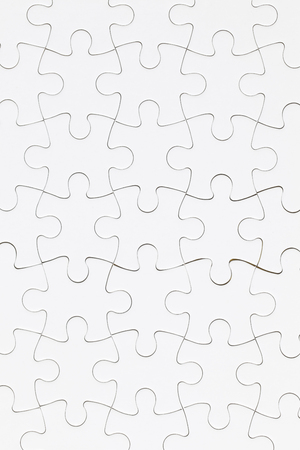 White jigsaw puzzle pieces background. Business solution conceptの写真素材