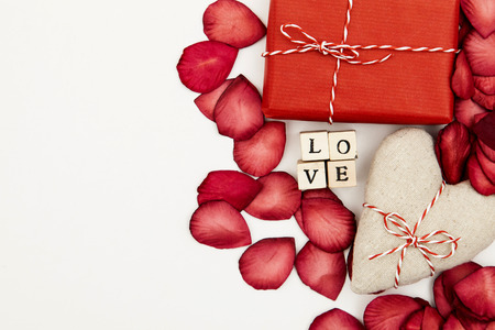 Valentines day present and rose petal backgroundの写真素材