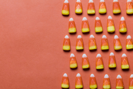 Halloween candy corn sweet background with copy space