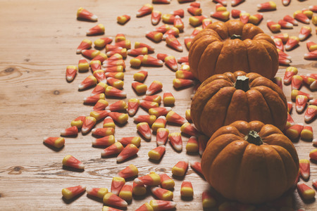 Pumpkin and candy corn autumn halloween background