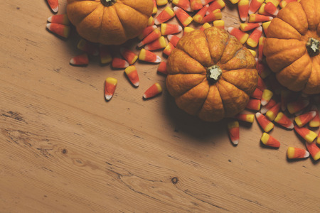 Pumpkin and candy corn autumn halloween background