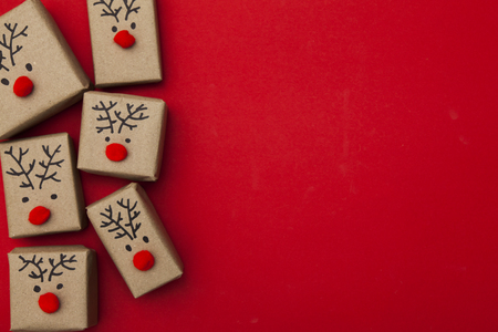 Christmas gift boxes with reindeer facesの写真素材